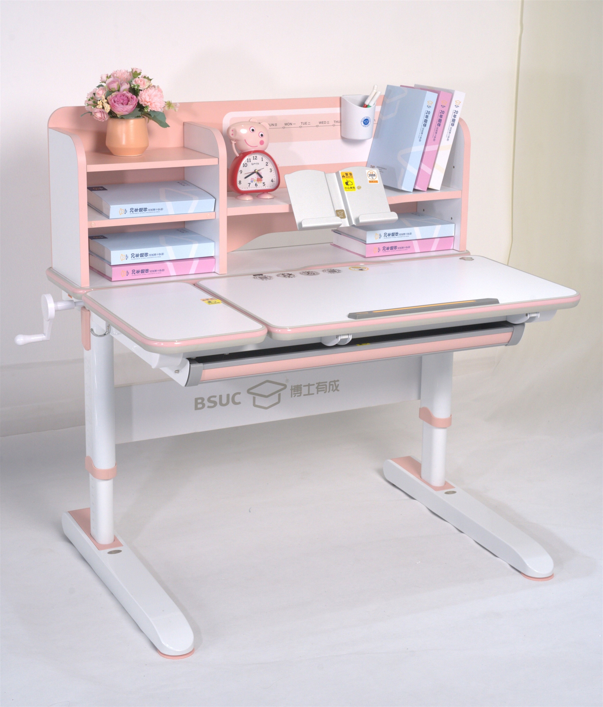 Bàn học thông minh chống gù chống cận nâng hạ chiều cao màu hồng